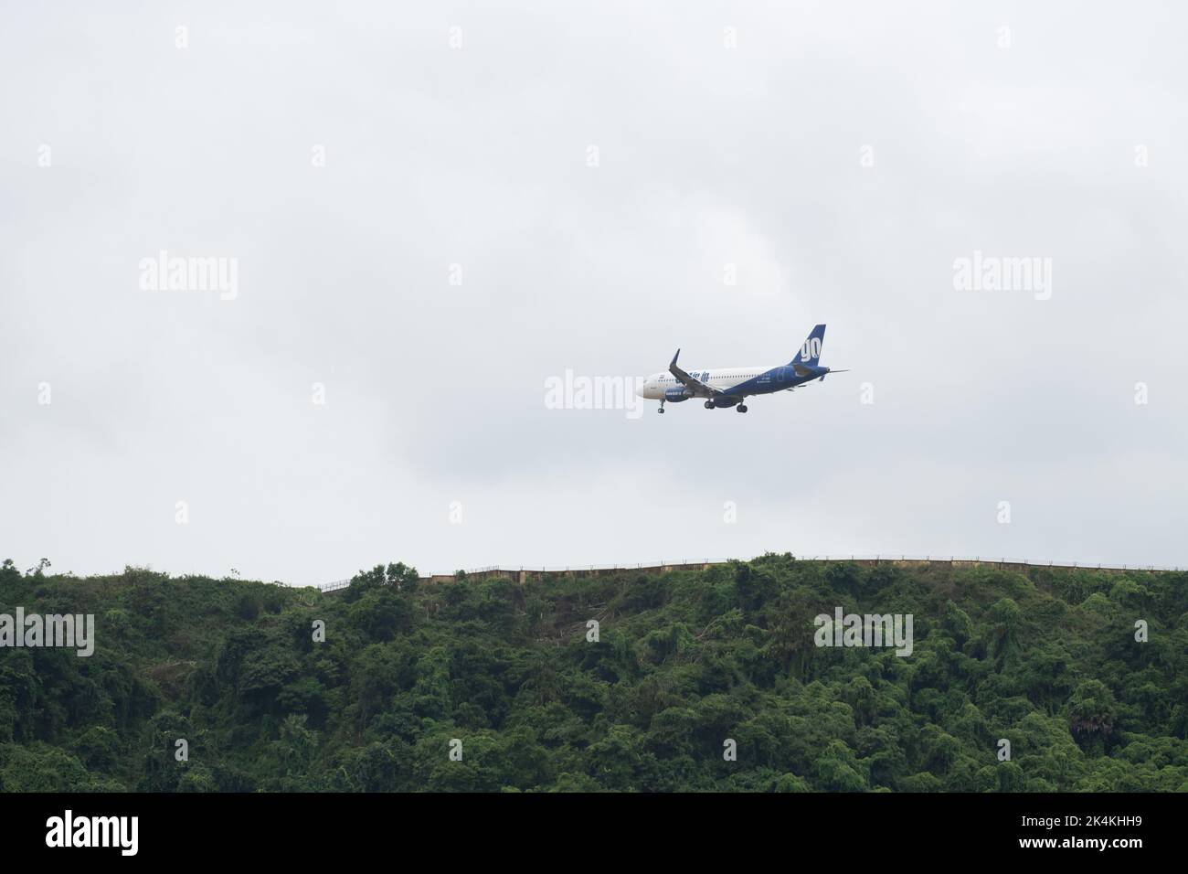 Mangalore, India - 3rd August, 2022 : An Go Air Airbus A320 flight coming in for landing at the dangerous tabletop runway of the Mangaluru Internation Stock Photo