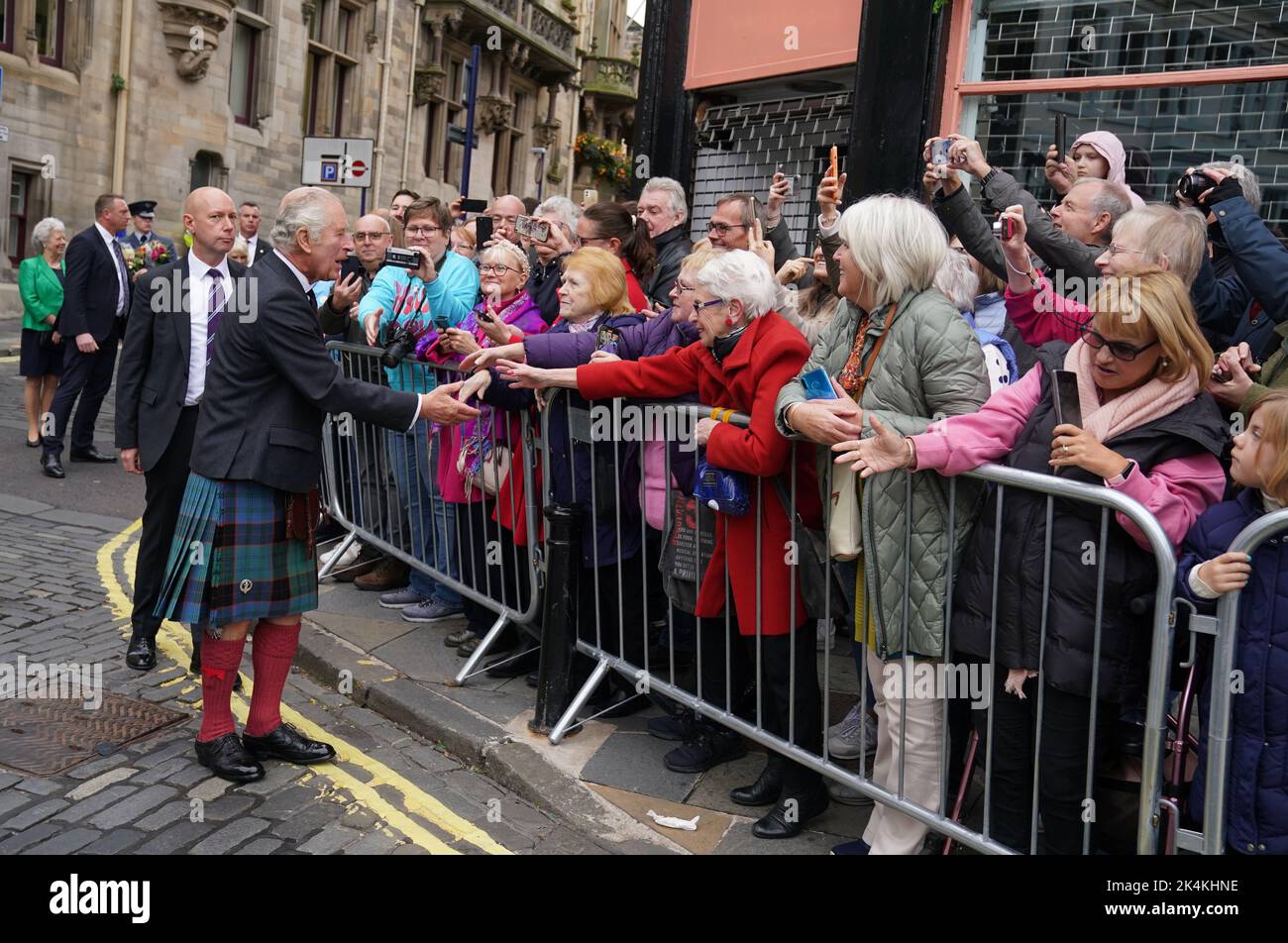 King Charles III meets the public on a walk about after attending an