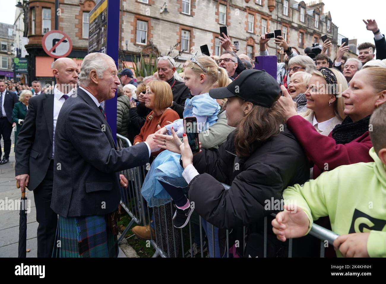 King Charles III meets the public on a walk about after attending an