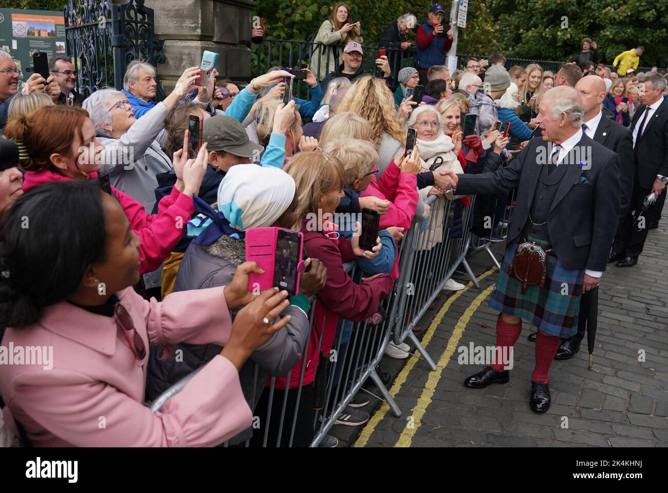 King Charles III meets the public on a walk about after attending an