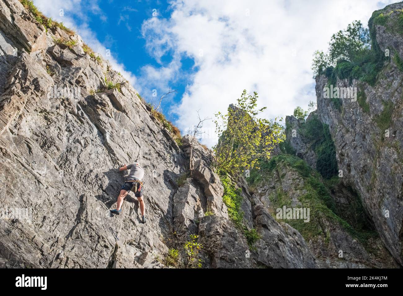 A rock climber at Cheddar Gorge in Somerset, England. Stock Photo