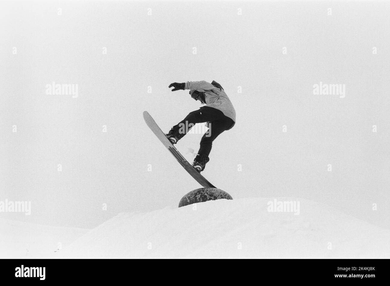 Snowboarder at Alpe D'Huez ski resort in the French Alps. Stock Photo