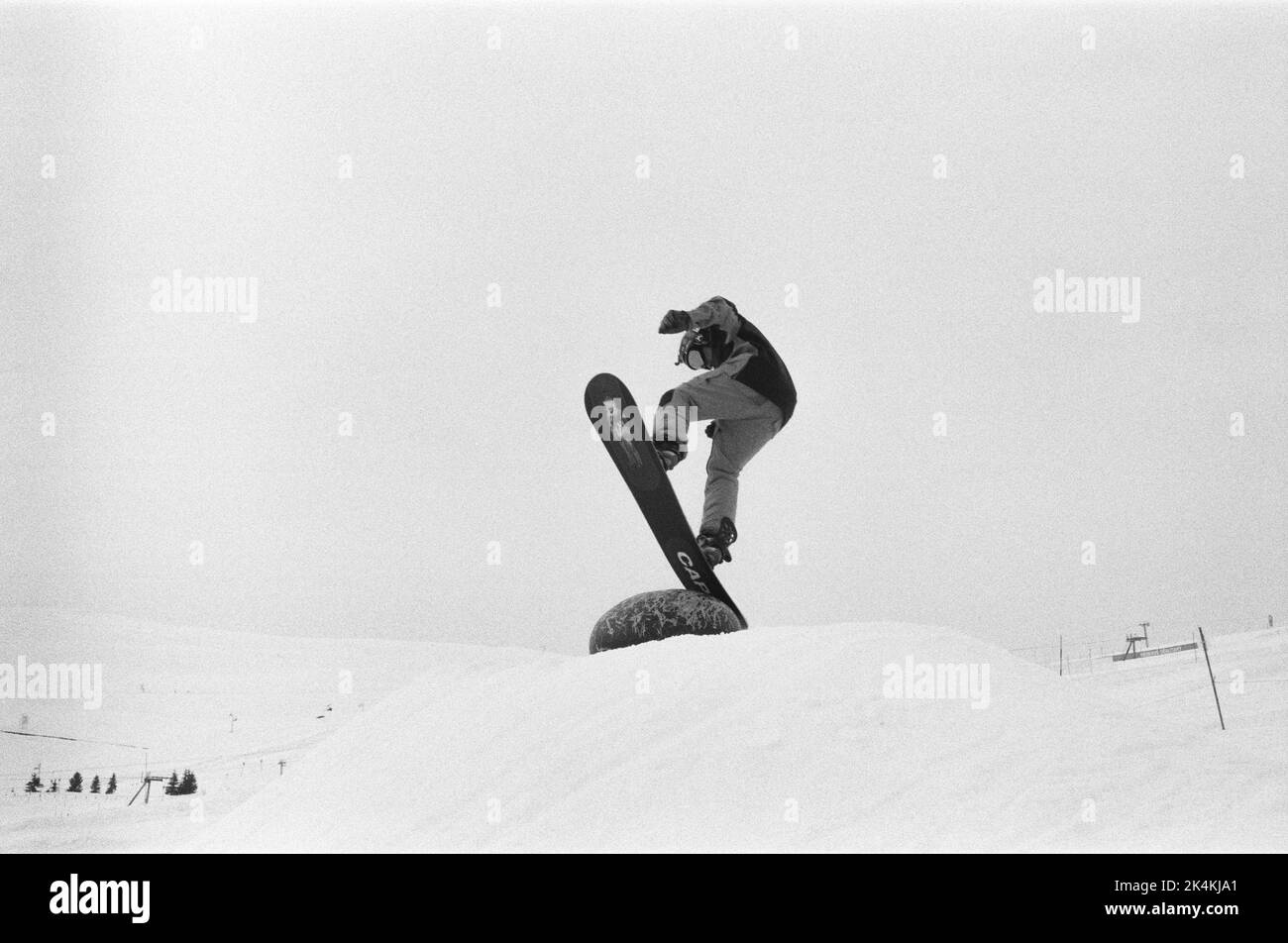 Snowboarder at Alpe D'Huez ski resort in the French Alps. Stock Photo