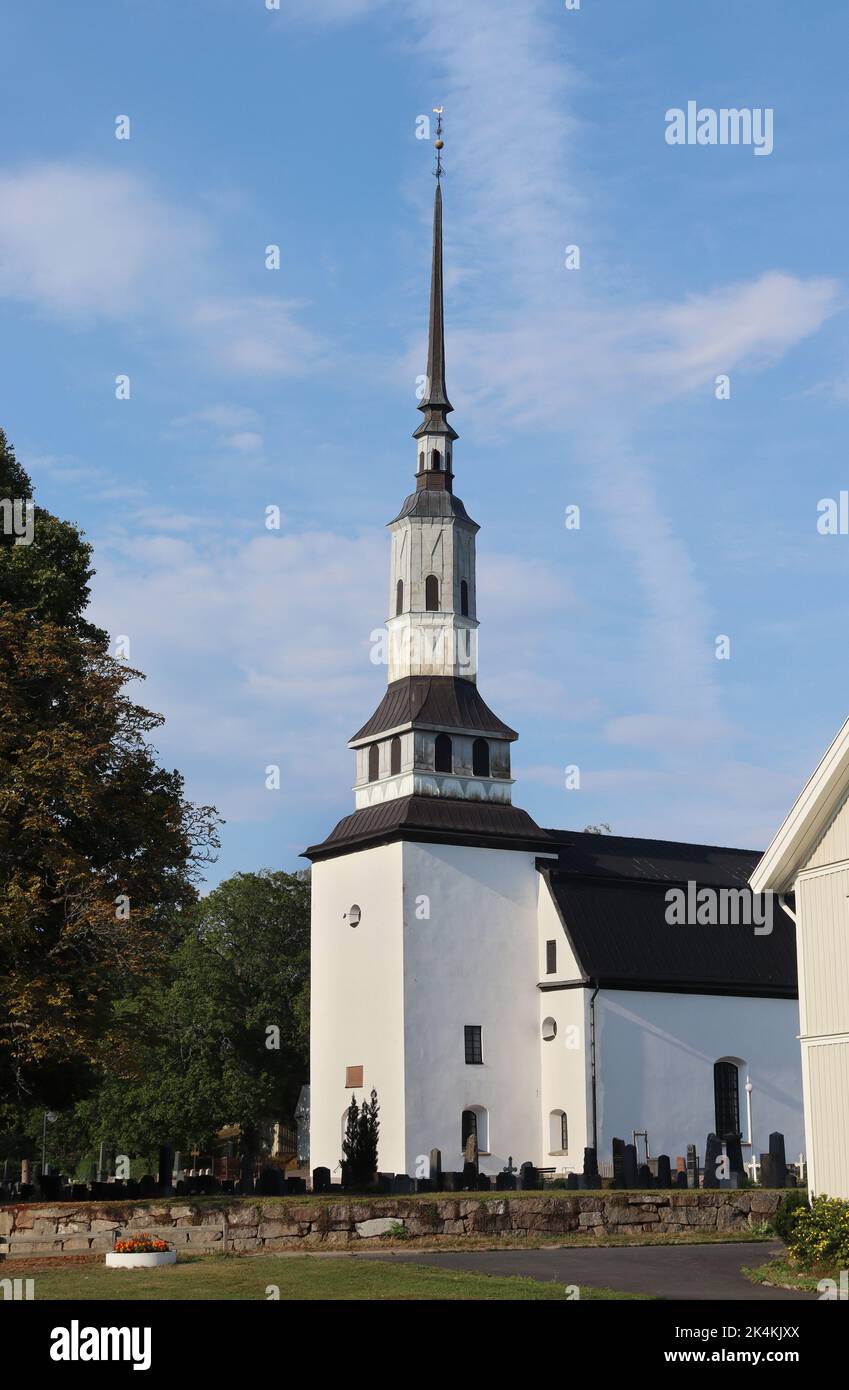 Summer evening view of the lovely white church at Horn in Kinda Municipality, Östergötland County, in Sweden. Stock Photo