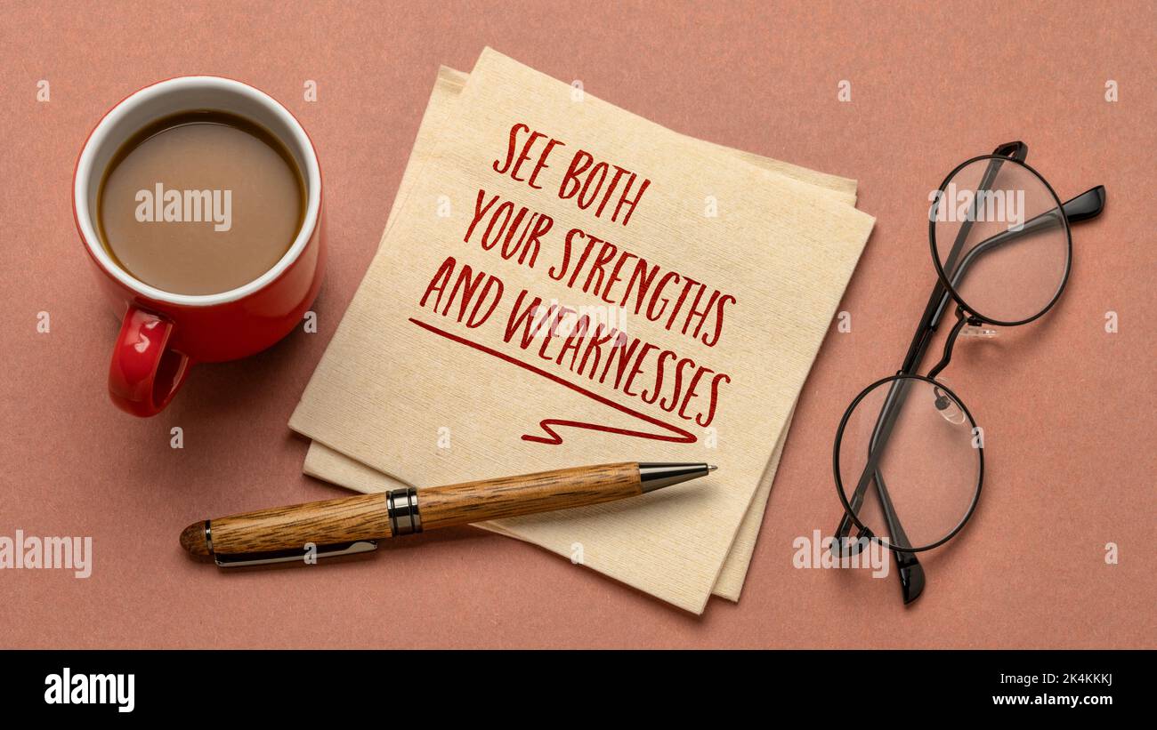 see both your strengths and weaknesses - inspirational reminder or advice on a napkin, personal development concept Stock Photo