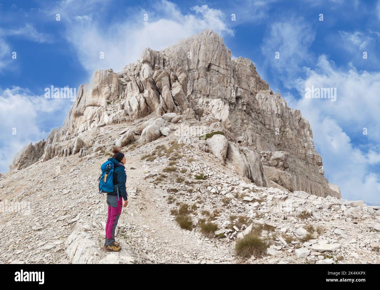 Monte Corvo (Italy) - High peak in the mountain range named Gran Sasso, Abruzzo region, with hiker who practice trekking over 2500 meters Stock Photo