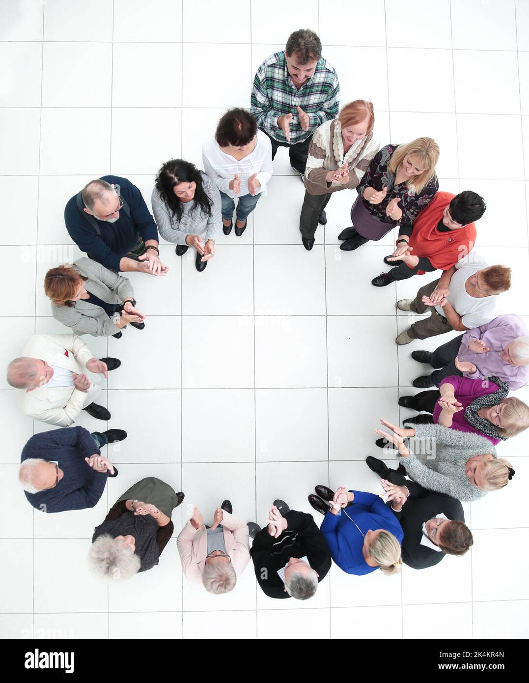 group of diverse senior people applauding standing in a circle Stock ...