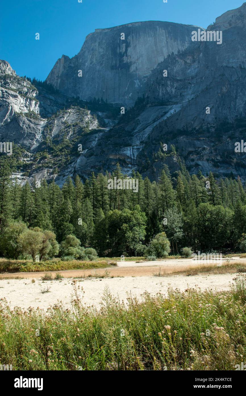Mirror Lake sits at the base of Half Dome in Yosemite National Park, CA ...