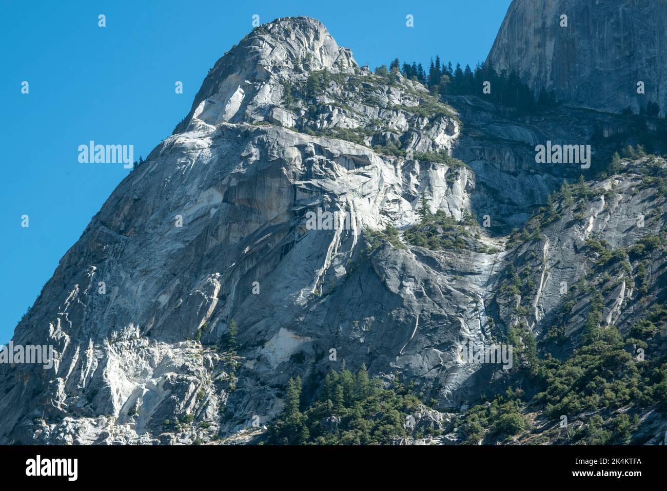 Mirror Lake sits at the base of Half Dome in Yosemite National Park, CA ...