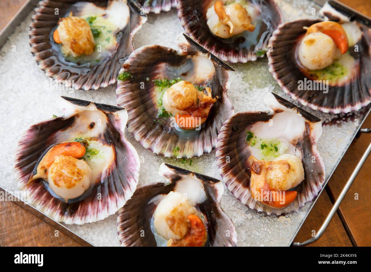 Scallops tapas, with garlic and parsley butter Stock Photo