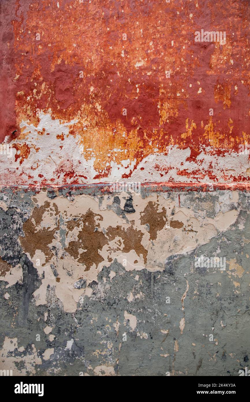 Old wall with paint peeling off Stock Photo