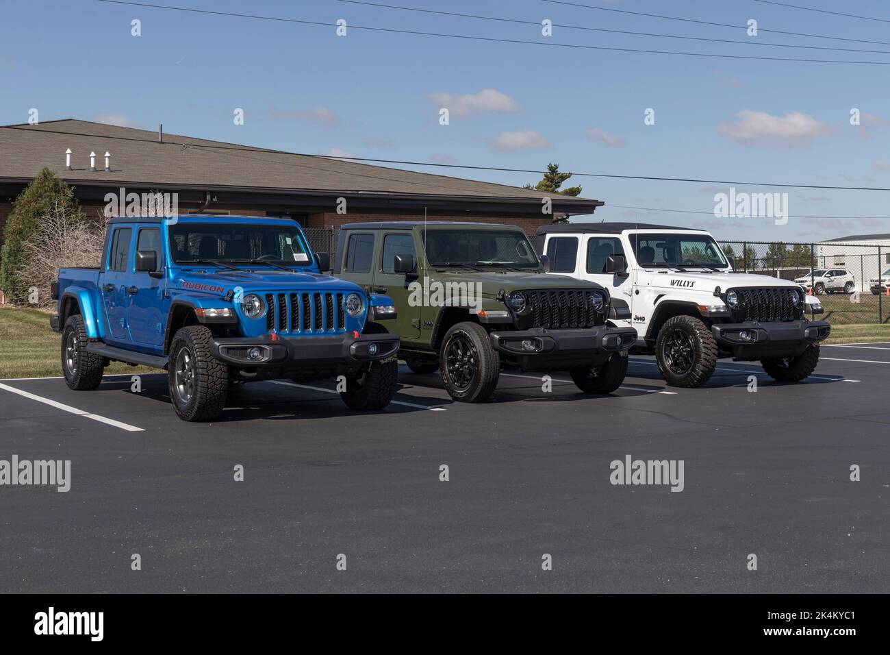 Kokomo - Circa October 2022: Jeep Gladiator display at a Stellantis dealer. The Jeep Gladiator models include the Sport, Willys, Rubicon and Mojave. Stock Photo