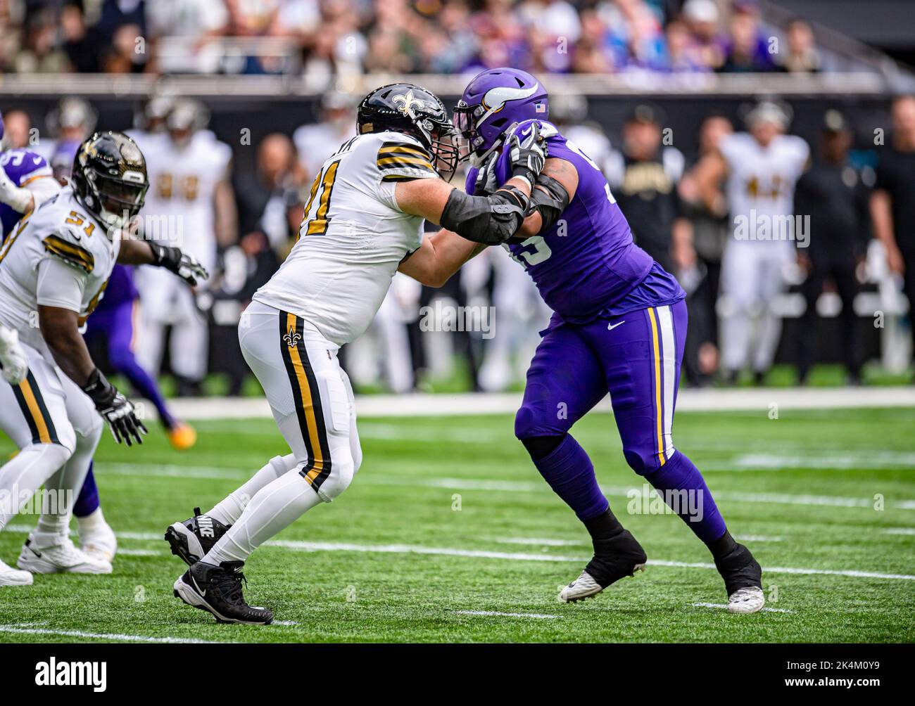 LONDON, UNITED KINGDOM. 02nd, Oct 2022. Bradley Roby of New Orleans Saints (left) is tackled during NFL 2022 London Series - Minnesota Vikings vs New Orleans Saints at Tottenham Hotspur Stadium on Sunday, 02 October 2022. LONDON ENGLAND.  Credit: Taka G Wu/Alamy Live News Stock Photo