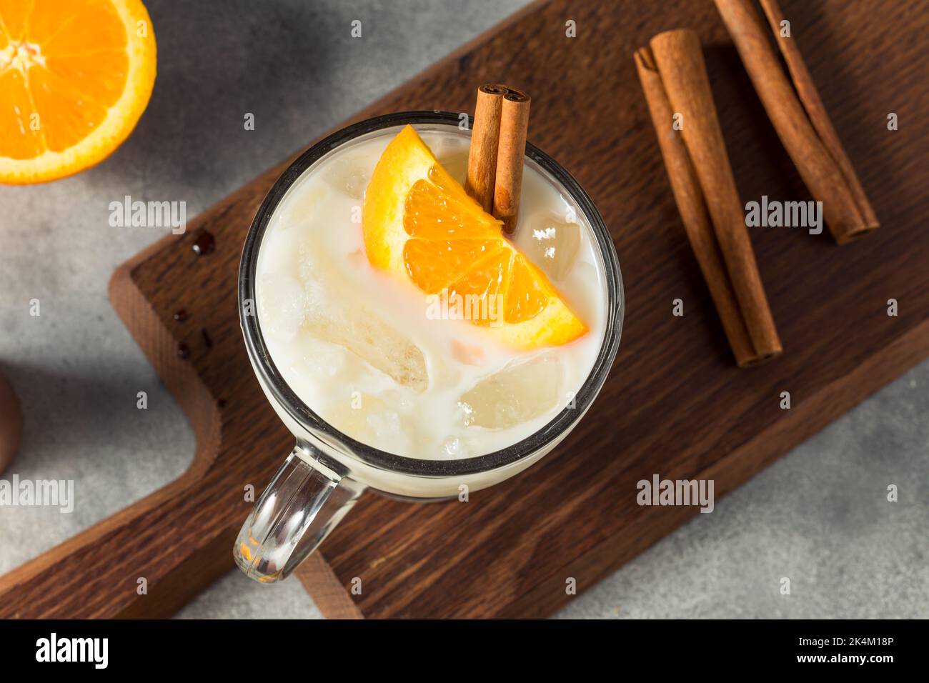Boozy Refreshing Milk and Honey Cocktail with Benedictine and Cinnamon Stock Photo