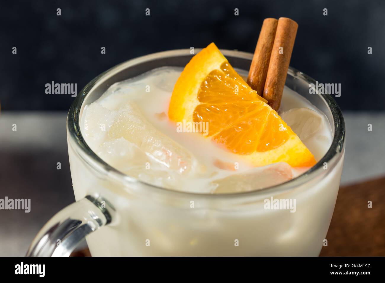 Boozy Refreshing Milk and Honey Cocktail with Benedictine and Cinnamon Stock Photo