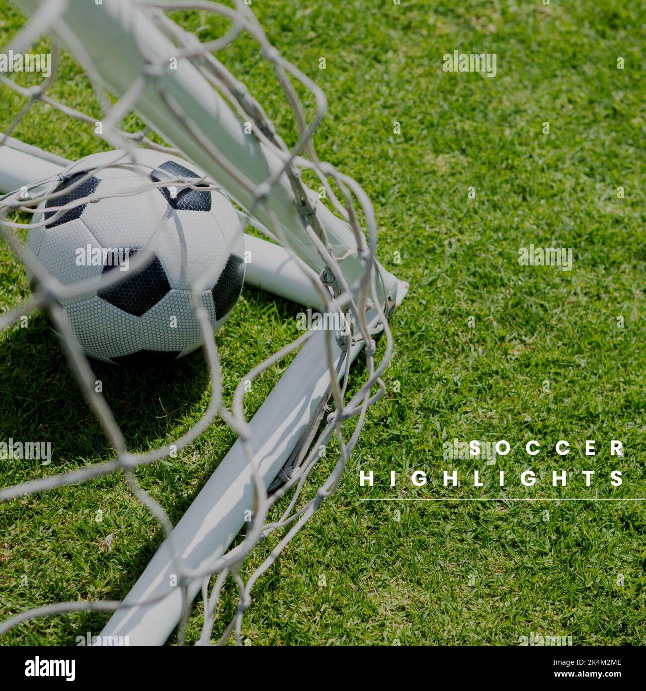 Composition of soccer highlights text with football in goal on pitch Stock Photo Alamy