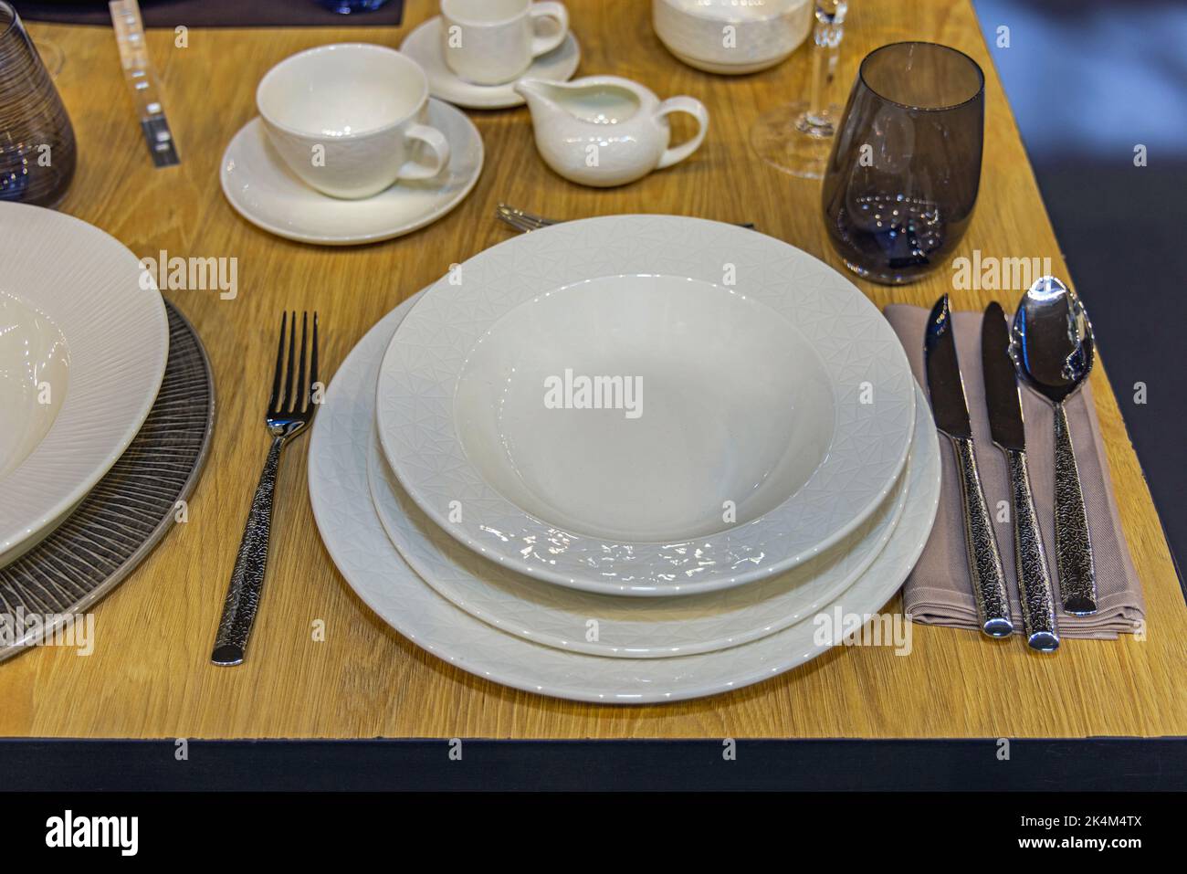 White Ceramic Plate With Eating Silver Utensils Flatware Table Setup