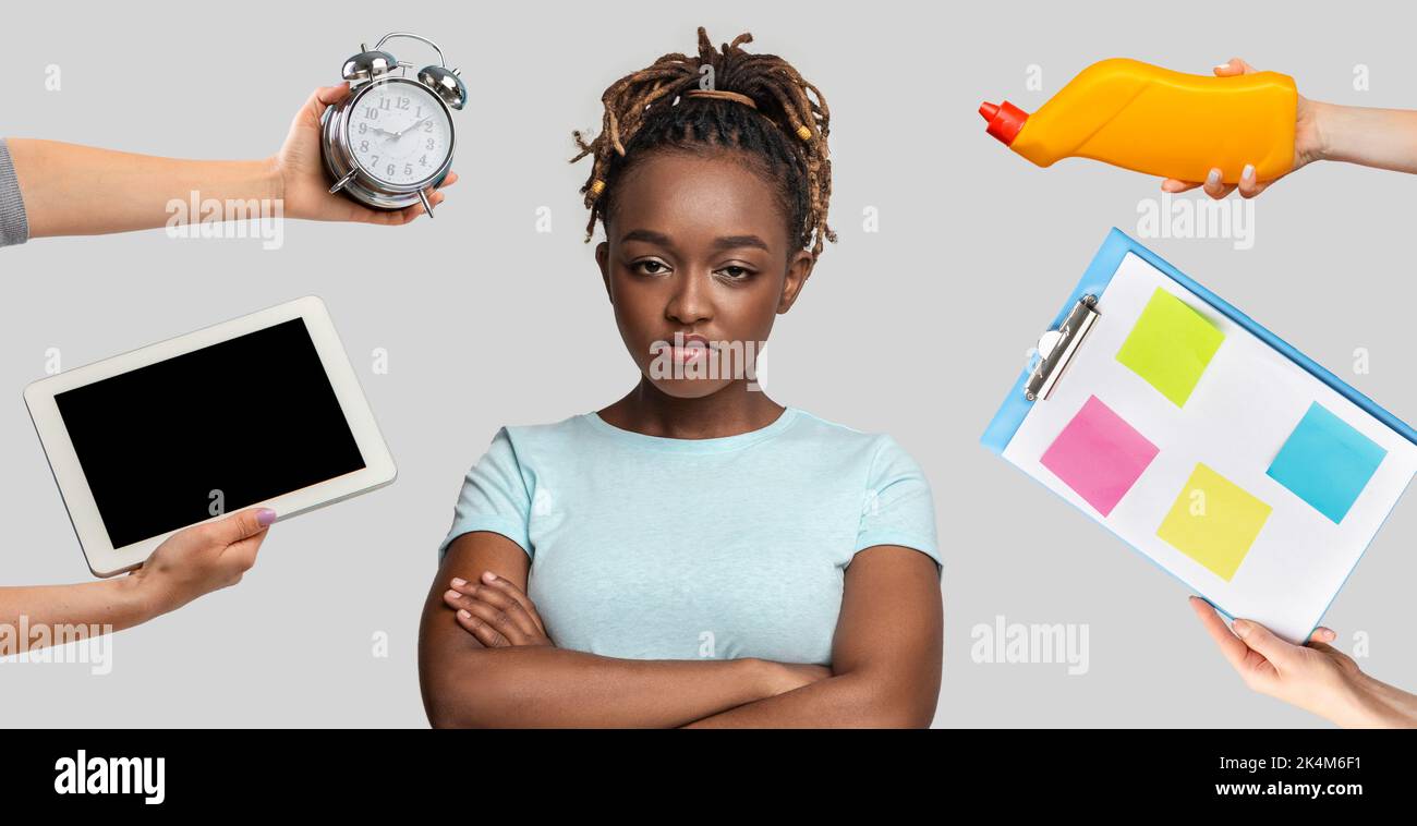 Angry millennial black woman having difficulties with daily routine Stock Photo