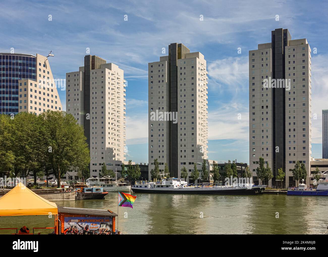 Stone High Rise Rotterdam, Netherlands - July 11, 2022: 3 identical, beige stone high ...