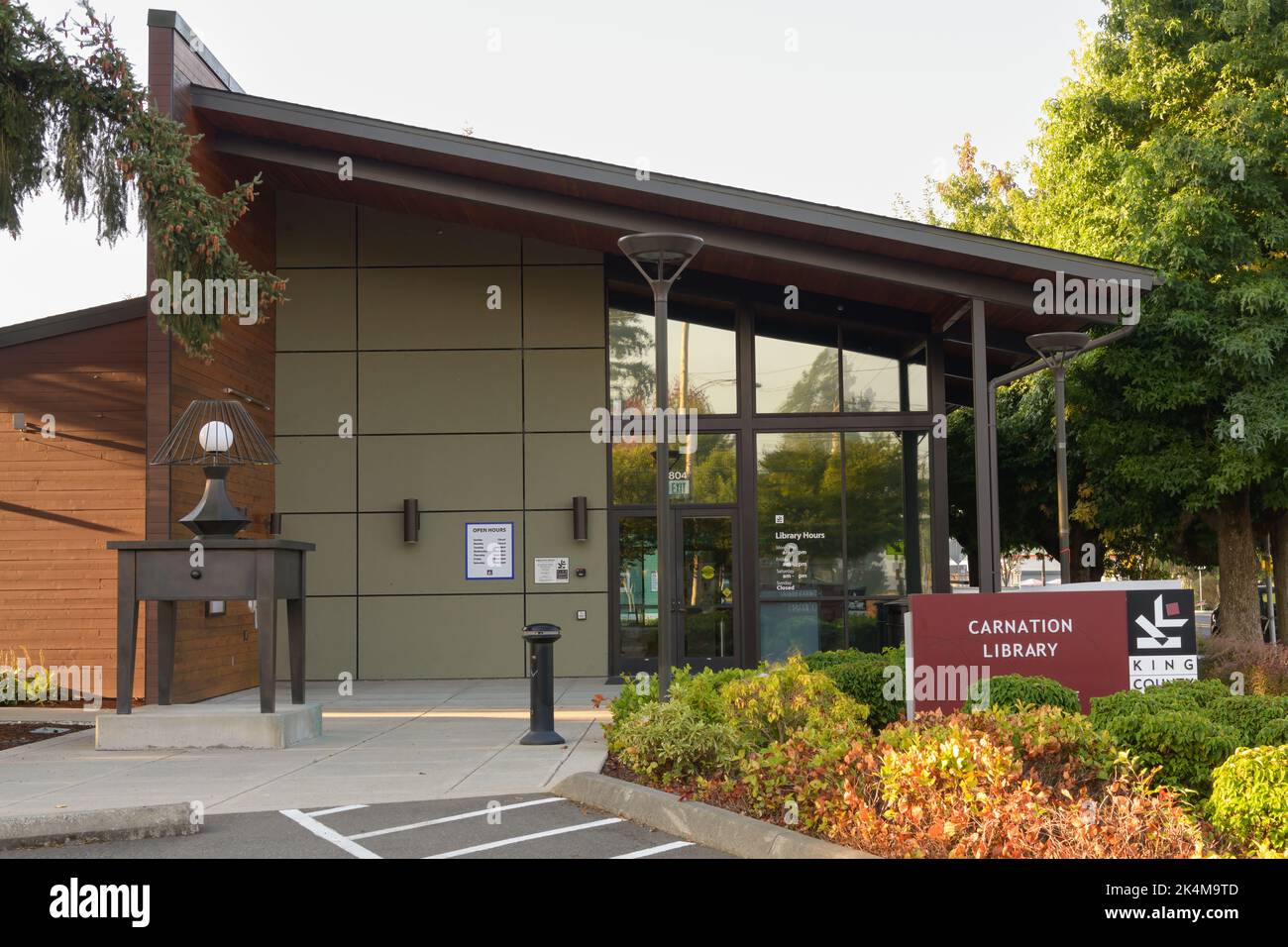 Carnation, WA, USA - October 02, 2022; King County Library System branh in Carnation and entrance with sign and artwork Stock Photo