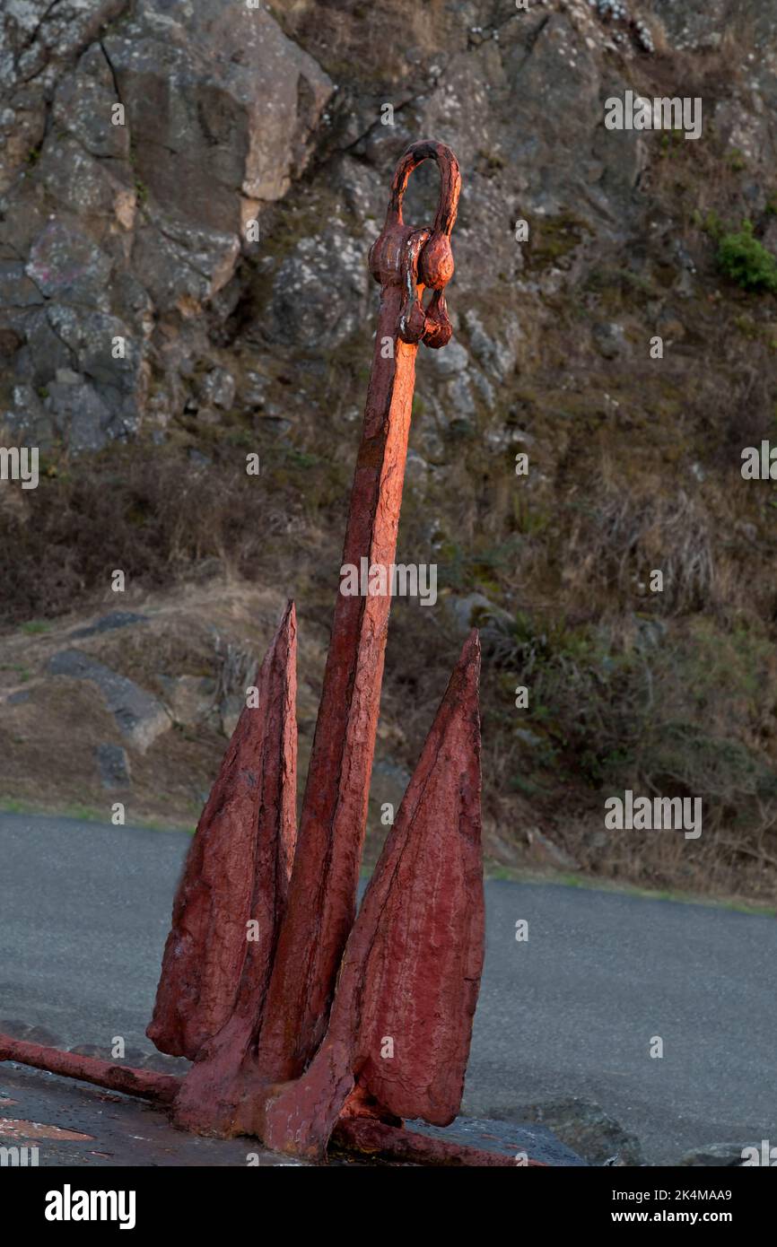 Classic 'Danforth'  fluke-type rusty boat anchor,  coastal bay, California. Stock Photo