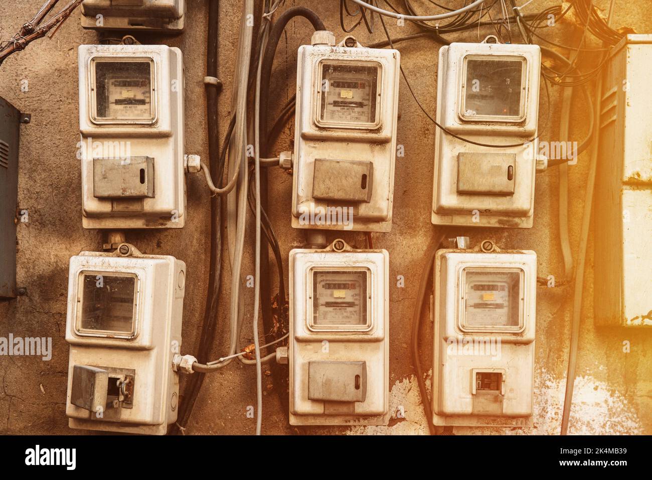 Various Electric Meters Stand A Row. Energy Consumption Concept. Impact