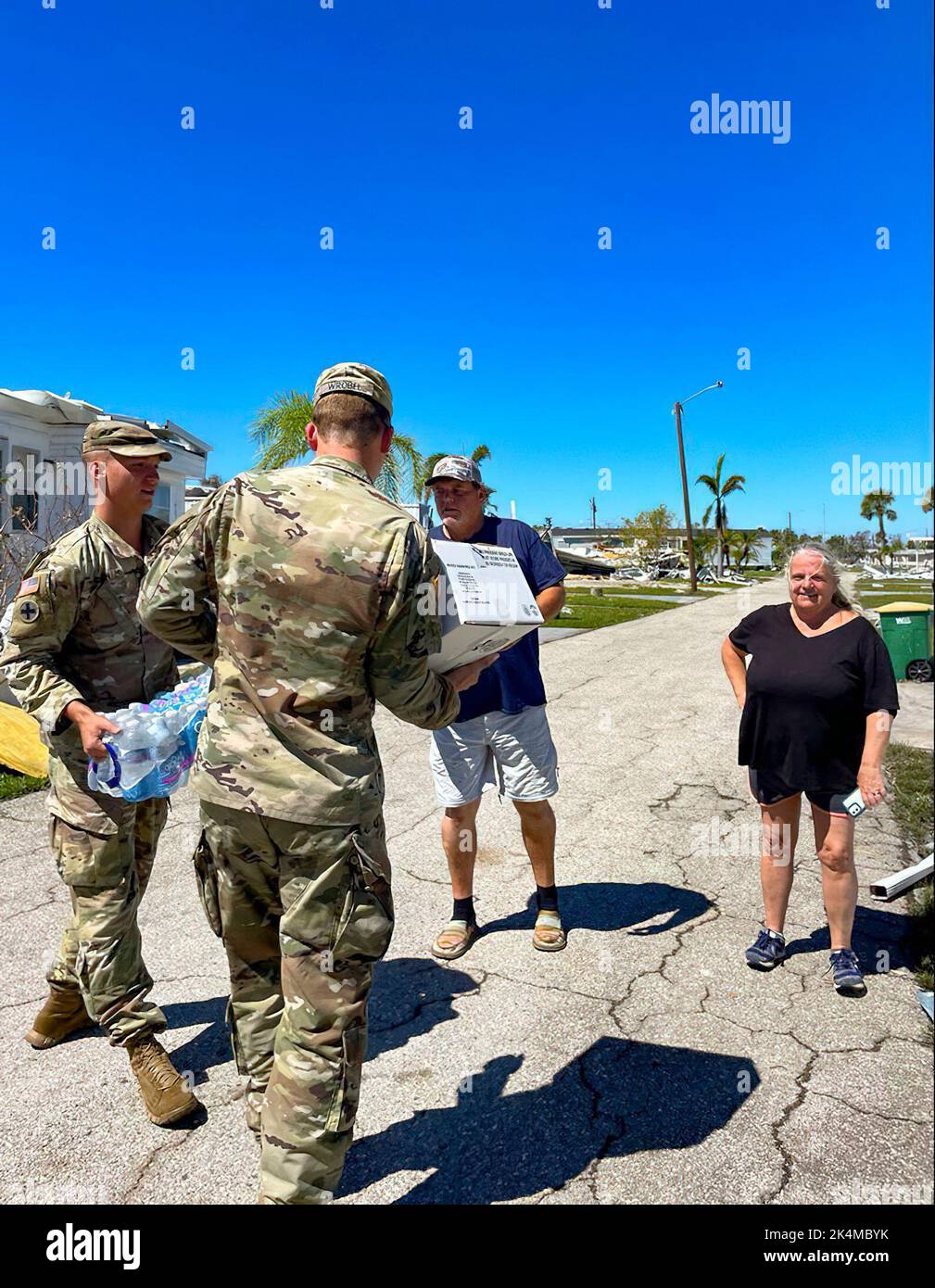 Florida Army National Guard Soldiers from 1-265 Air Defense Artillery (ADA) deliver food to neighborhoods in Placida, Fla., by Hurricane Ian, October 2, 2022. We have forces operating throughout the state, providing assistance to the areas of greatest need. Stock Photo