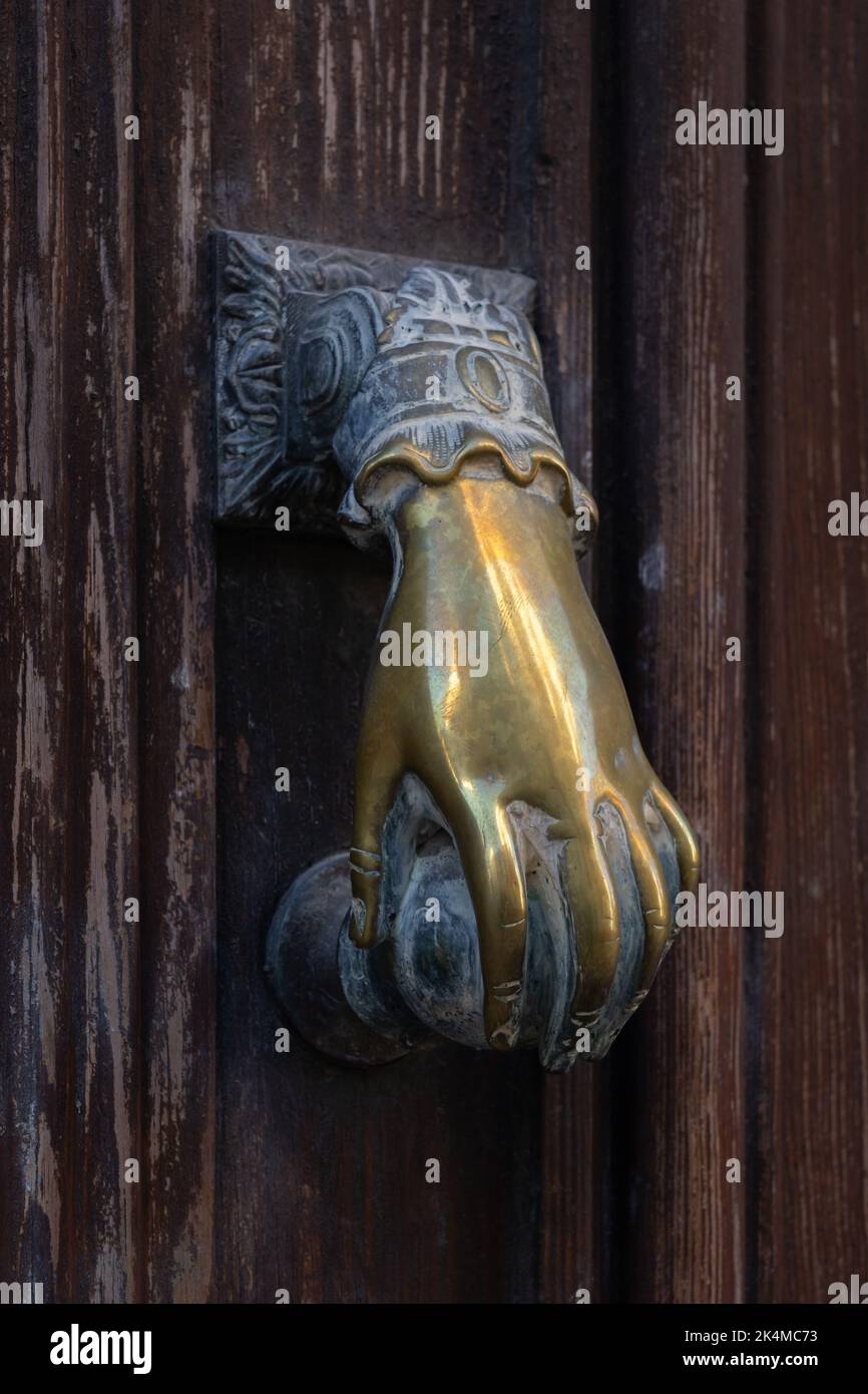 Close up hand door knocker hires stock photography and images Alamy