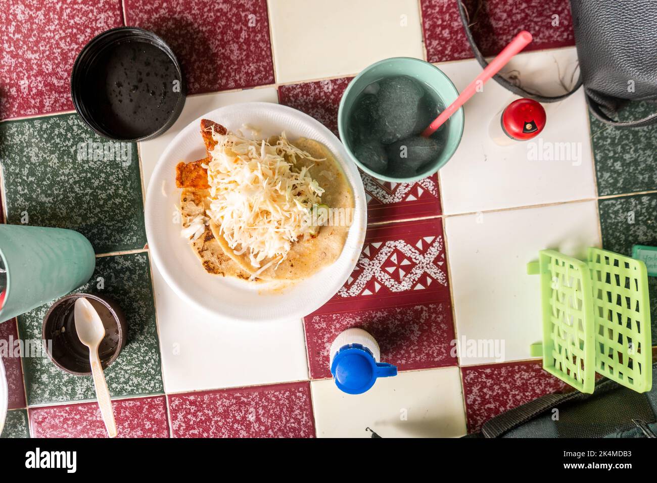 Fried pork dish with tortilla and cabbage salad traditional food from