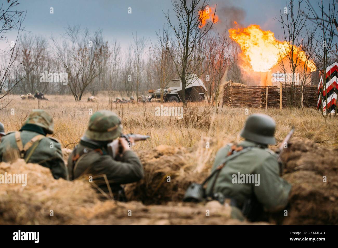 Reenactors Armed Rifles And Dressed As World War Ii German Wehrmacht