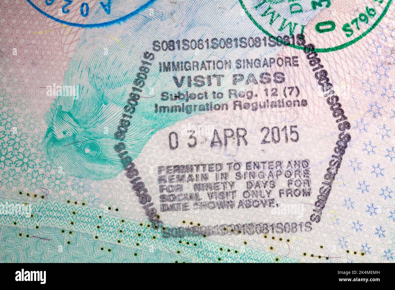 Immigration Singapore Visit Pass 03 Apr 2015 stamp in British passport Stock Photo
