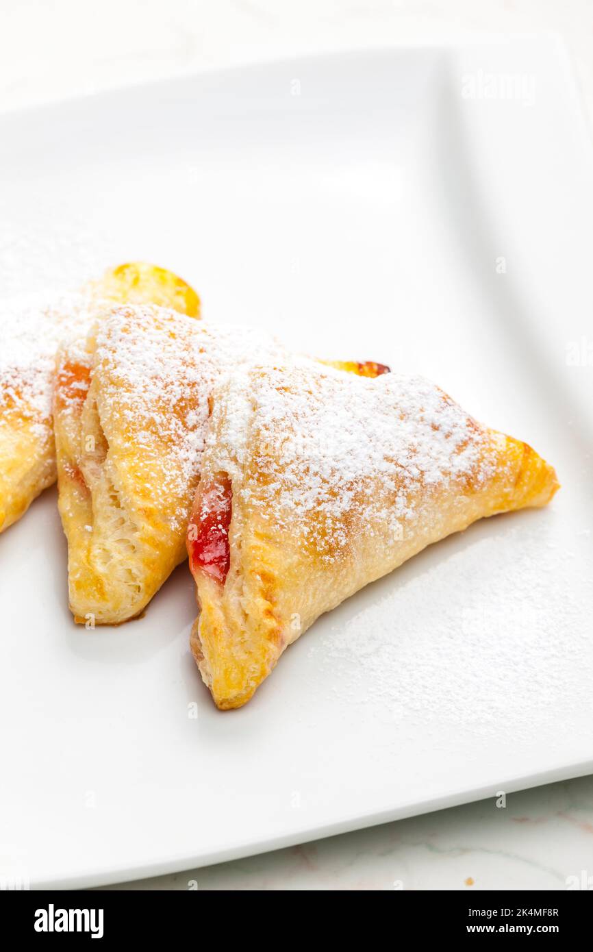 homemade puff pastry filled with strawberry jam Stock Photo - Alamy