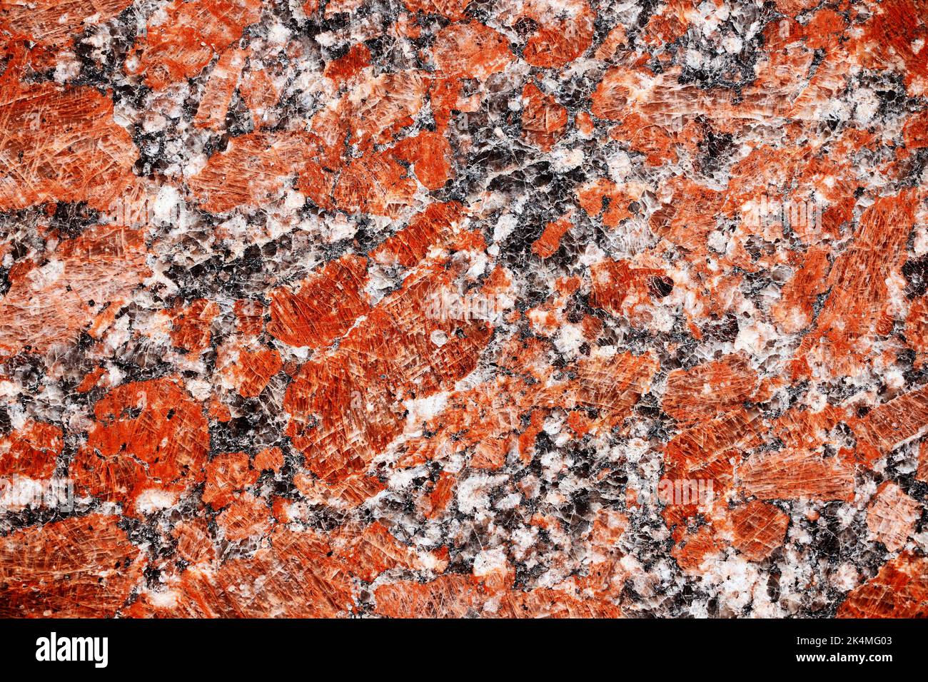 Red granite tile texture close up. Nature granite texture background
