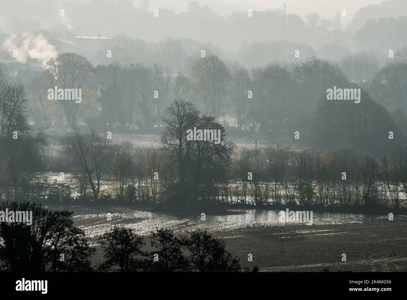Morning mist and waterlogged fields in the Derwent Valley at Belper, Derbyshire after a flood Stock Photo