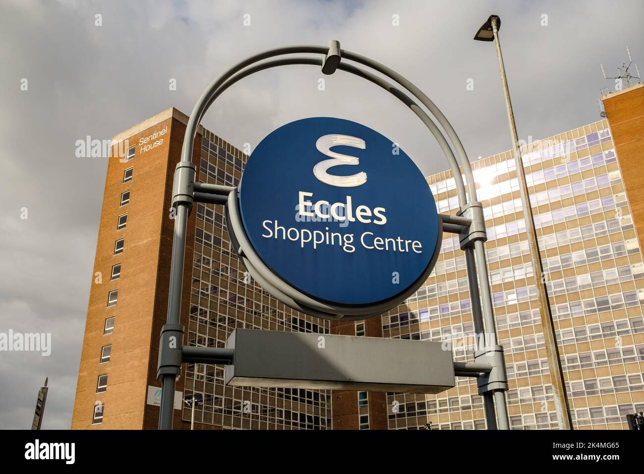 Eccles shopping centre sign with large offices in background Stock