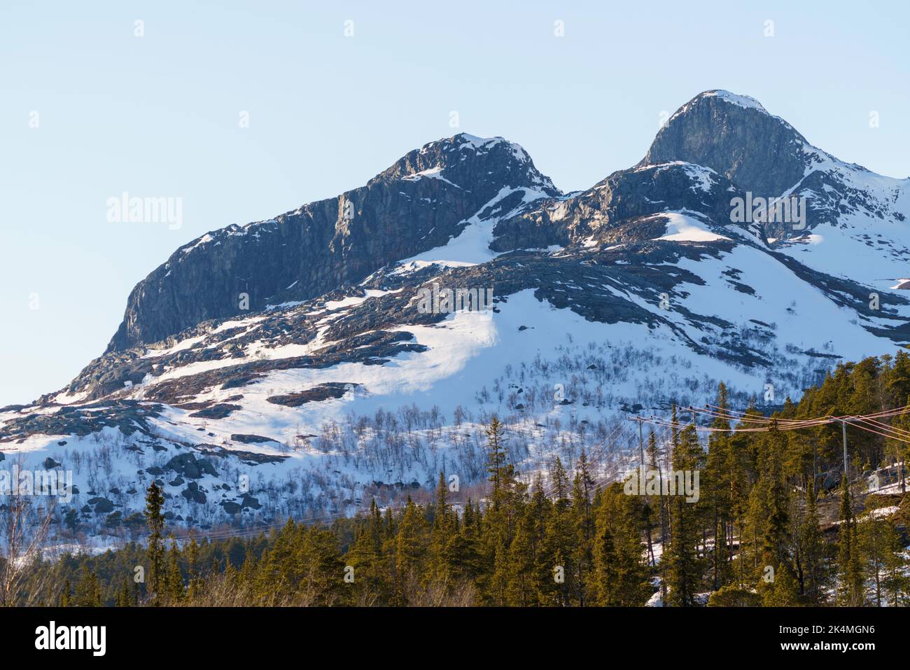 Snowy landscape in spring time with mountains in background, Stora sjöfallets nationalpark, Laponia world heritage, Swedish Lapland, Sweden. Stock Photo