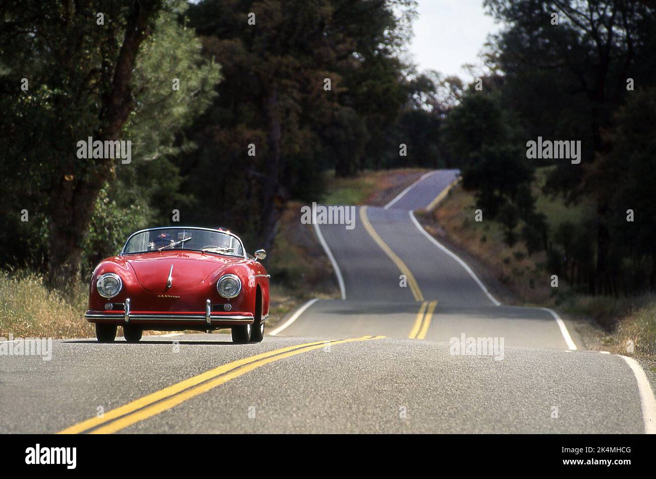 Classic Porsche 356 cabriolet driving on some bye ways of California USA Stock Photo