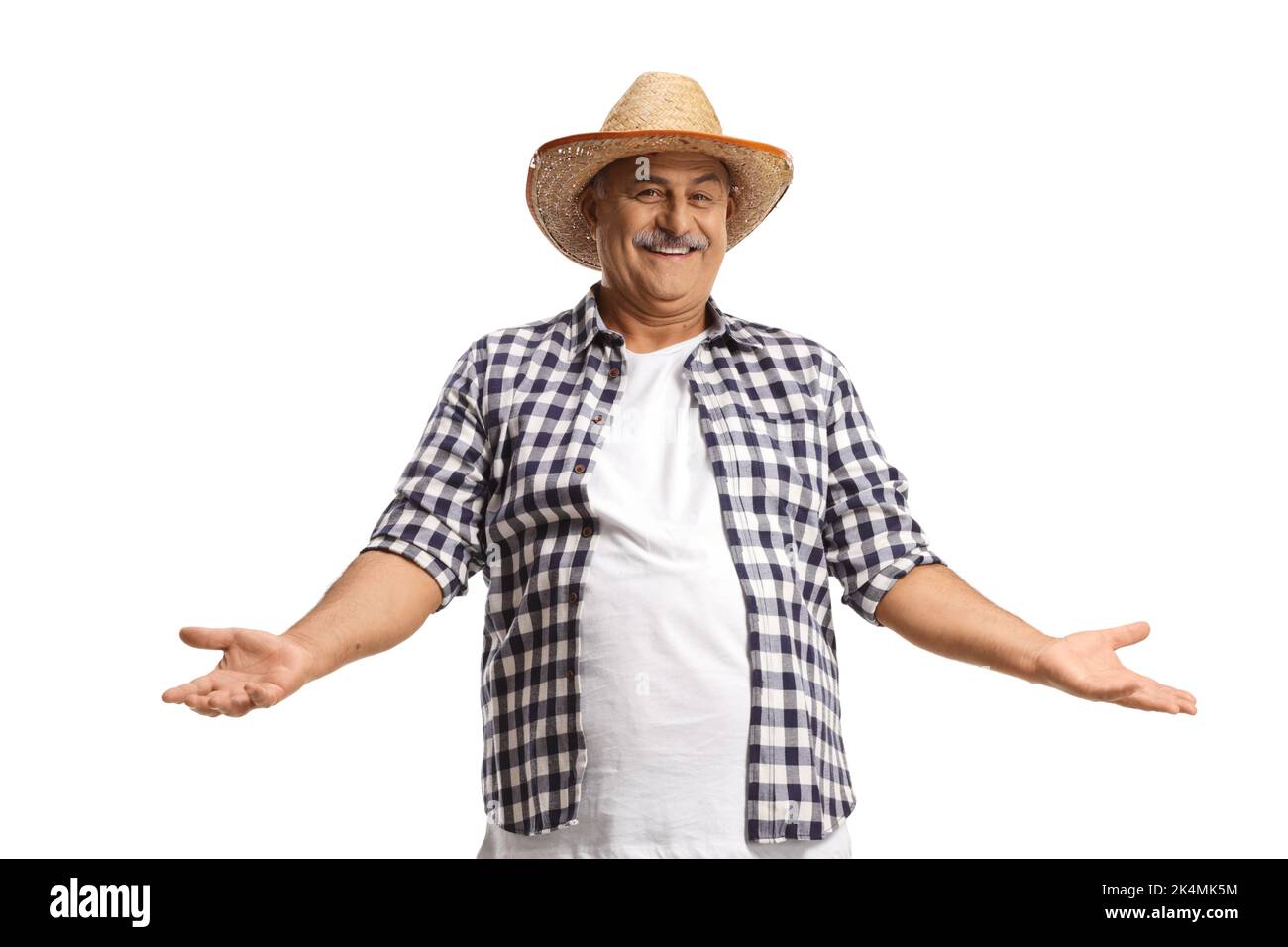 Happy mature farmer with a straw hat gesturing with hands isolated on white background Stock Photo