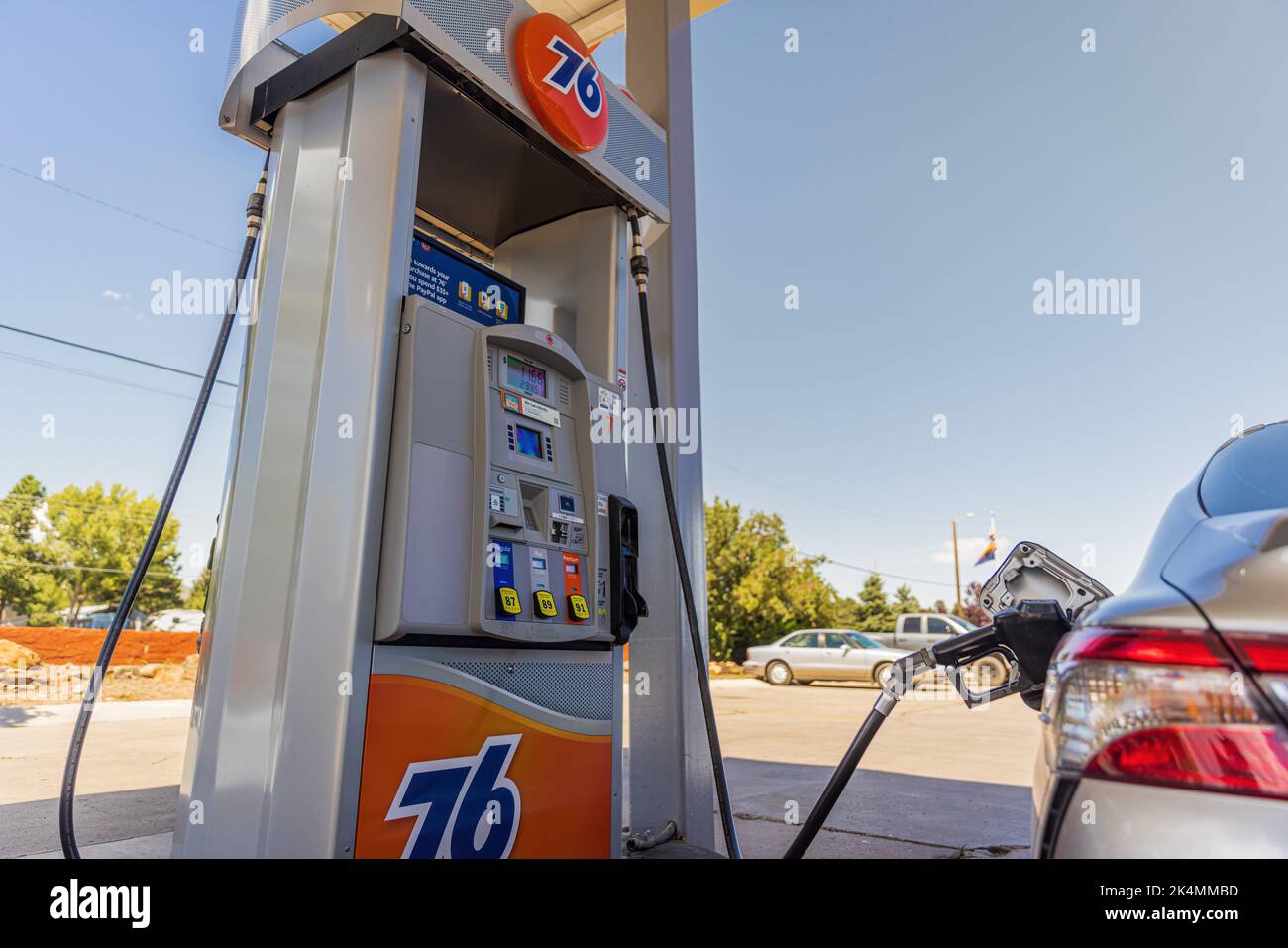 FLAGSTAFF, AZ SEPTEMBER 2, 2022 Wide view of car getting gas at a