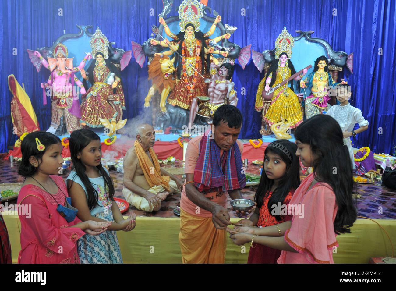 Sylhet, Bangladesh. 1st Oct, 2022. On Mahasaptami day of Durga Puja, Anjali is being offered to the devotees in Machudighi Para. on October 1, 2022 in Sylhet, Bangladesh. (Credit Image: © Md Rafayat Haque Khan Eyepix G/eyepix via ZUMA Press Wire) Stock Photo