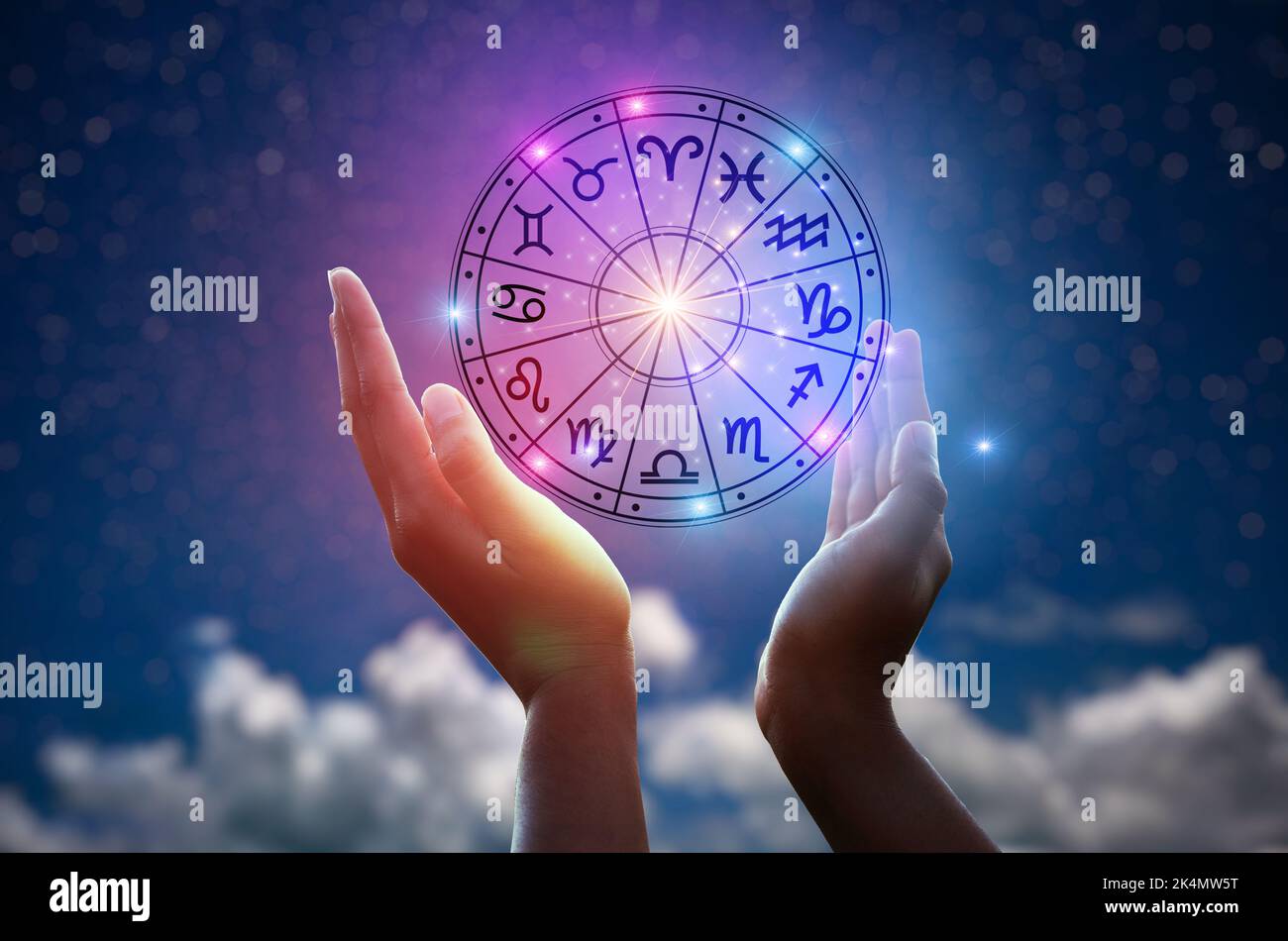 Zodiac signs inside of horoscope circle. Astrology in the sky with many stars and moons  astrology and horoscopes concept Stock Photo