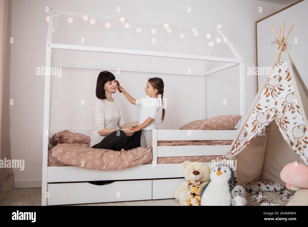 Beautiful little girl sit bedroom hi-res stock photography and images -  Alamy