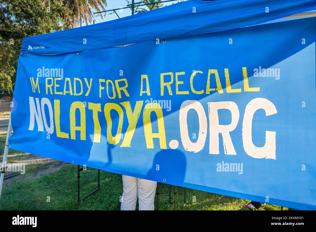NEW ORLEANS, LA, USA - SEPTEMBER 28, 2022: Banner for recalling New Orleans Mayor Latoya Cantrell at petition signing table on S. Carrollton Avenue Stock Photo