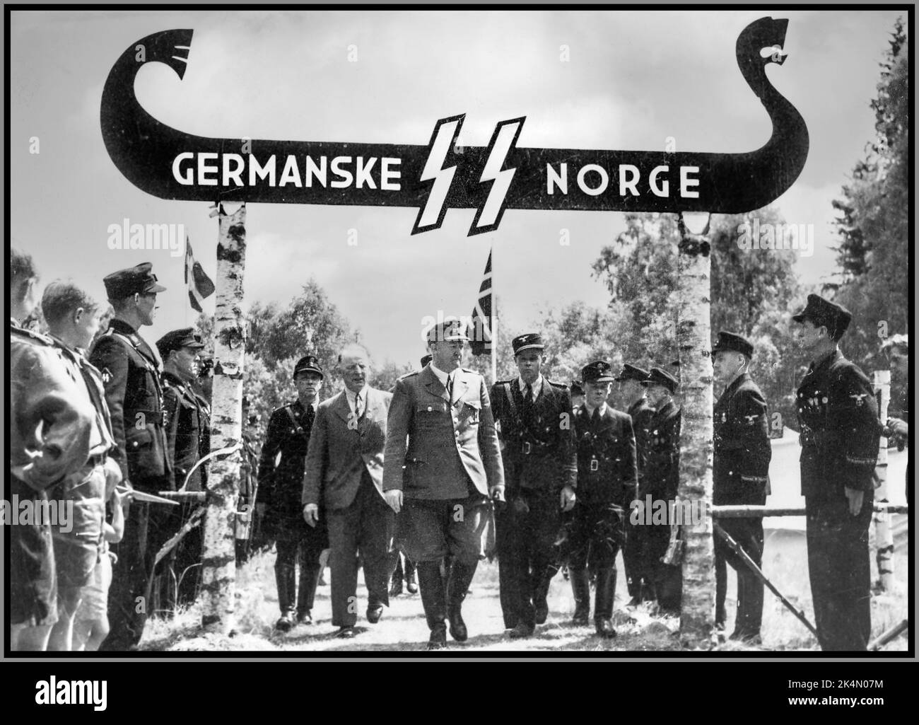 Vidkun Quisling visits the German SS Norway branch at the camp. In Filmavisen Norway on 28 June 1943 WW2 World War II Second World War Quisling Germanske SS Norges  Nasjonal Samling, abbreviated NS, was a Norwegian political party founded by Vidkun Quisling in 1933 and dissolved upon liberation in 1945. The party eventually aligned itself closely with the ideology of National Socialism and became a collaborator support organization for the Nazi German occupation forces in Norway during the Second World War. Stock Photo