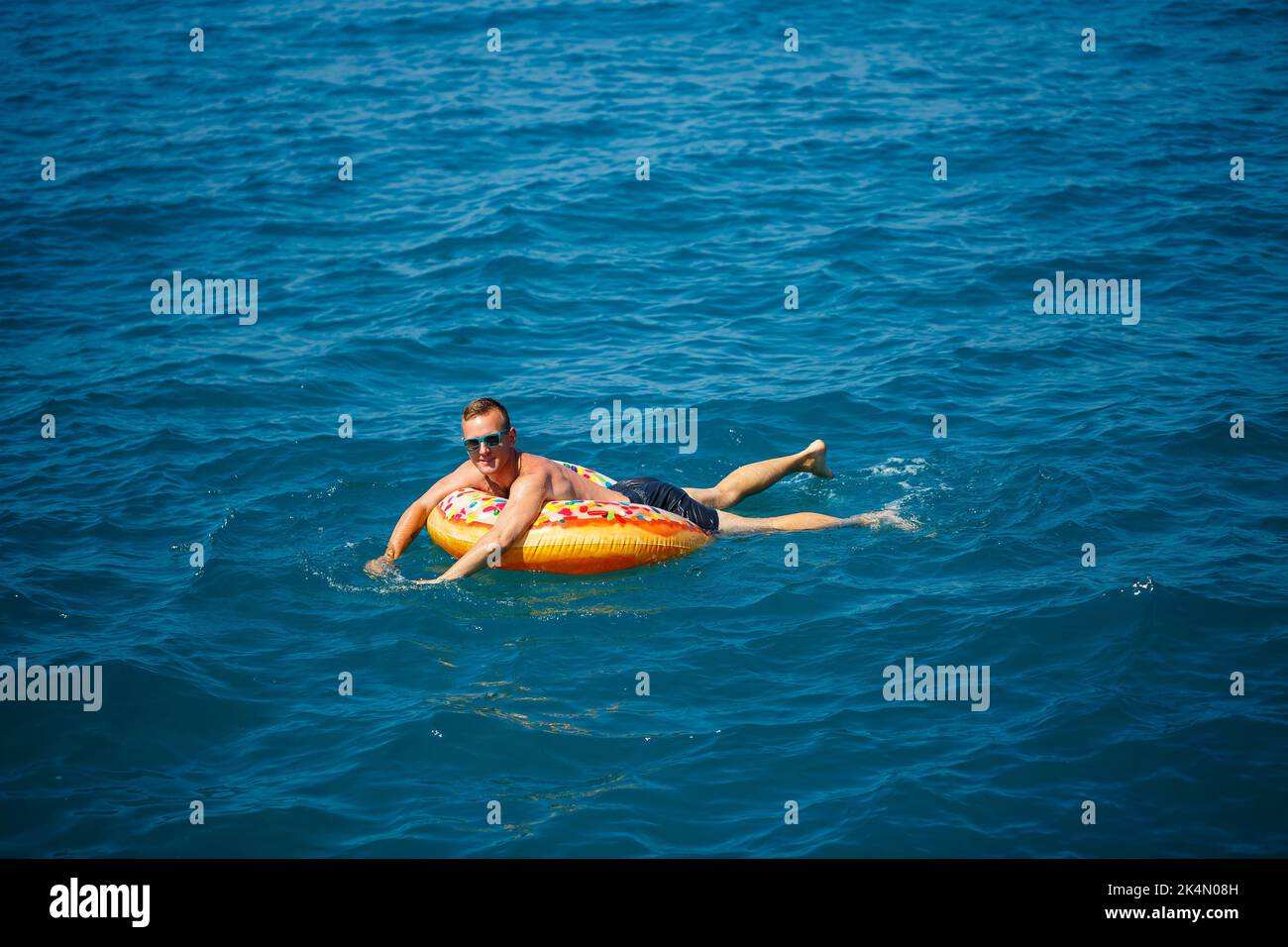 Fat man float pool hires stock photography and images Alamy