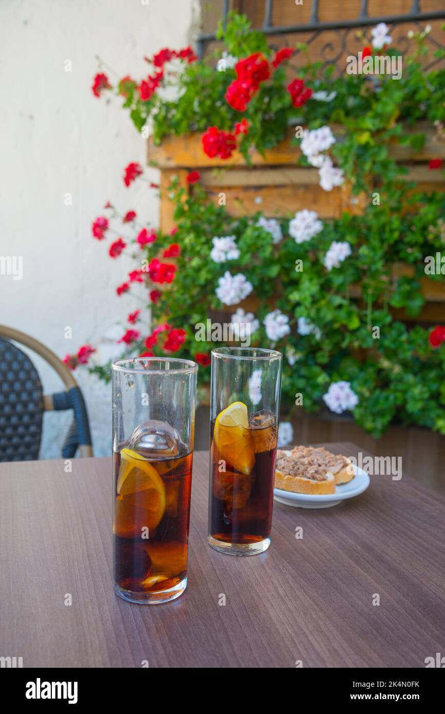 Two glasses of vermouth with tapa. Spain. Stock Photo