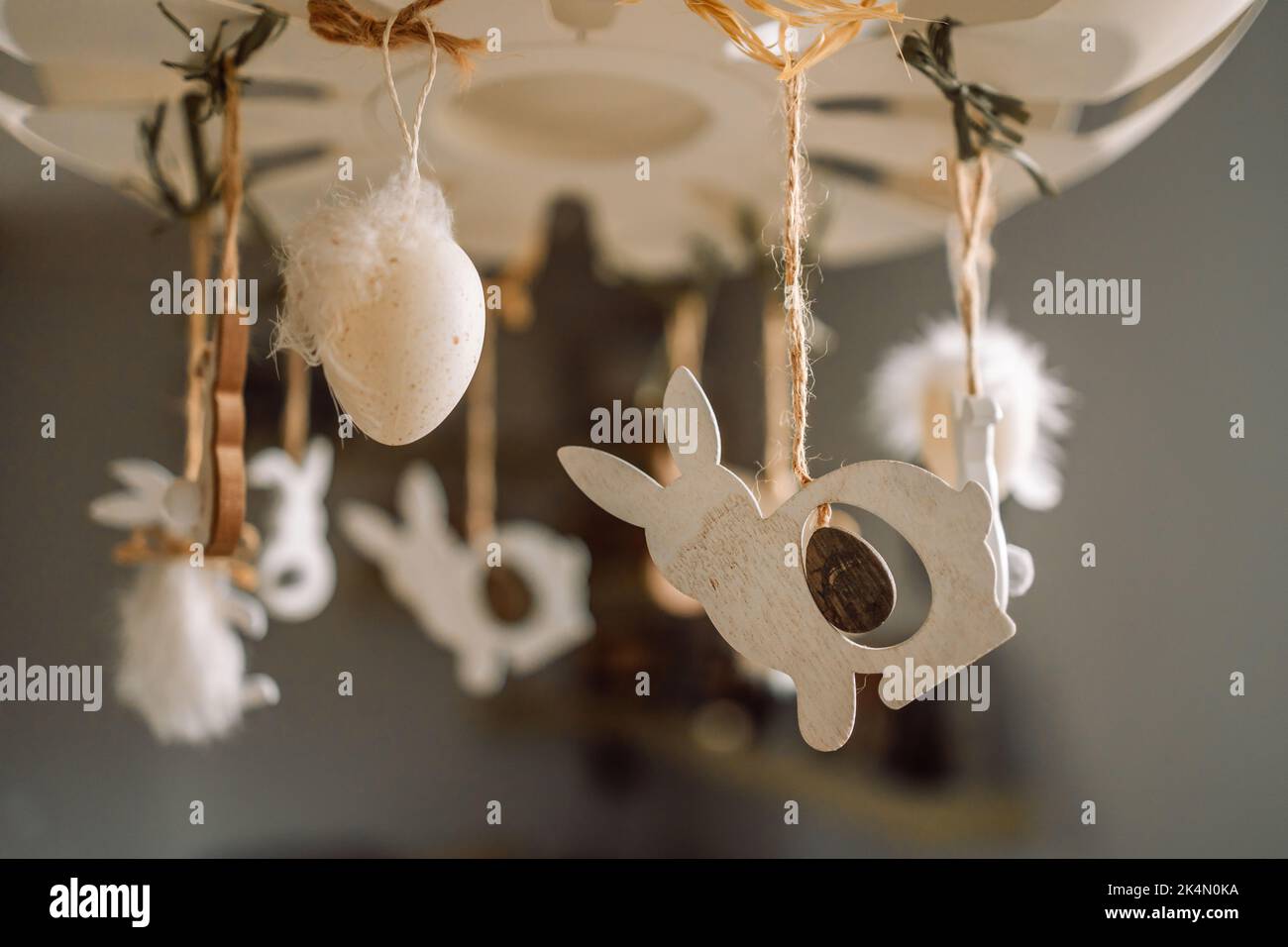 Home interior with easter decor, easter eggs on a light background Stock Photo