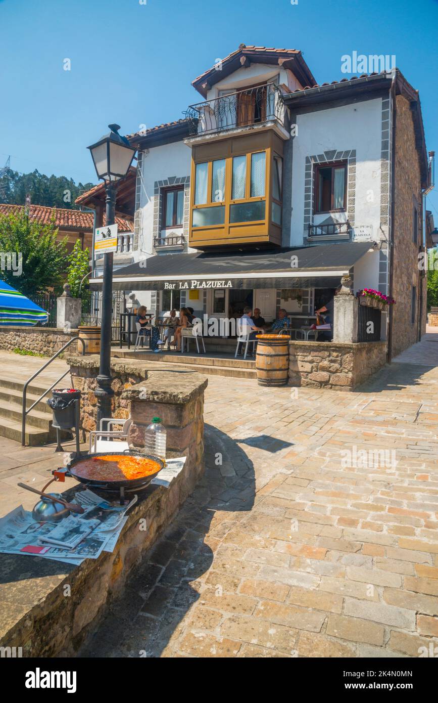 Paella and restaurant at La Plazuela Square. Riocorvo, Cantabria, Spain. Stock Photo