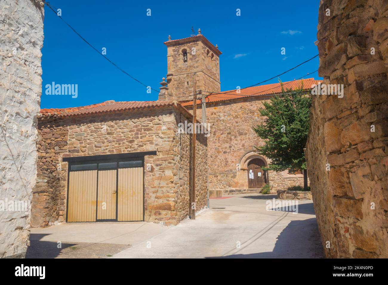 Street and church. Aldealseñor, Soria province, Castilla Leon, Spain. Stock Photo