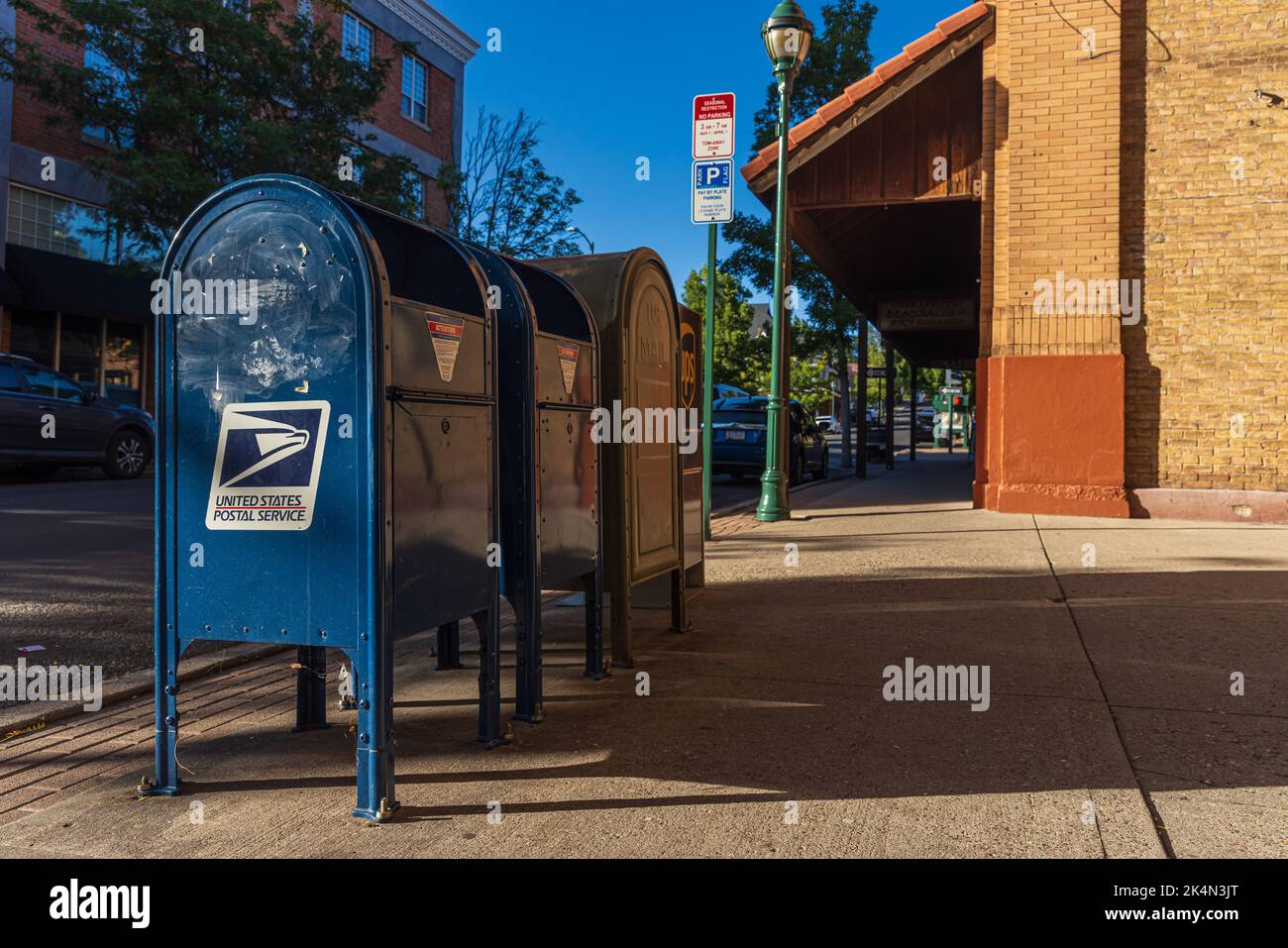 FLAGSTAFF, AZ / USA SEPTEMBER 1 2022 USPS mailbox on a street in